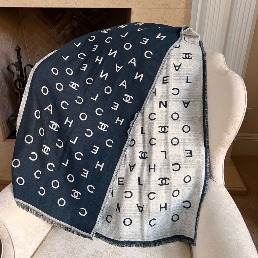 Authentic Chanel scarf two sided. Very beautiful and unique.